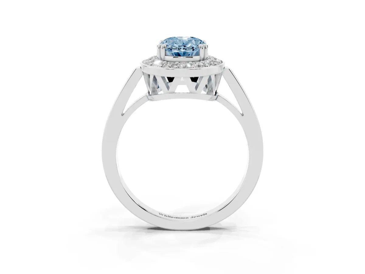 Fancy Blue Oval Cut Diamond Halo Ring with Split Shank and Four-Prong Setting White gold
