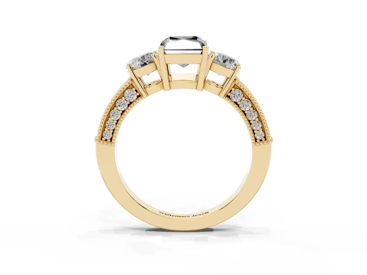 Fancy Black Radiant Cut Three-Stone Diamond Ring with Pavé Band and Four-Prong Setting Yellow gold