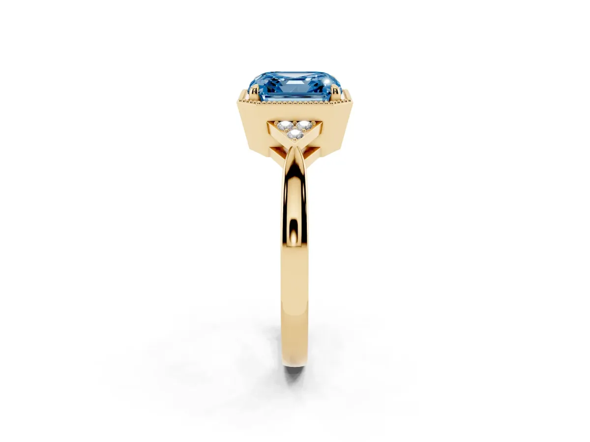 Fancy Blue Asscher Cut Diamond Halo Ring with Tapered Band and Four-Prong Setting Yellow gold