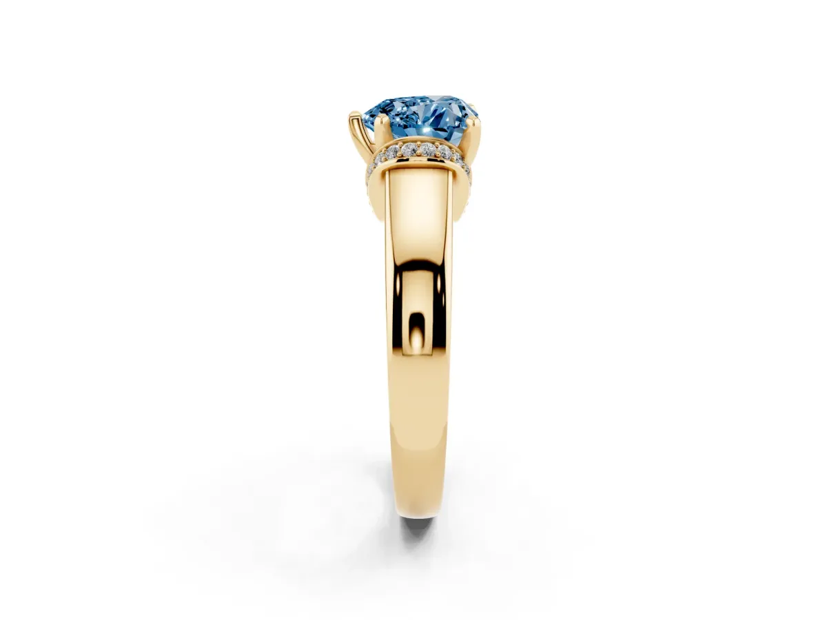 Fancy Blue Heart Cut Solitaire Diamond Ring with Pave Band and Six-Prong Setting Yellow gold