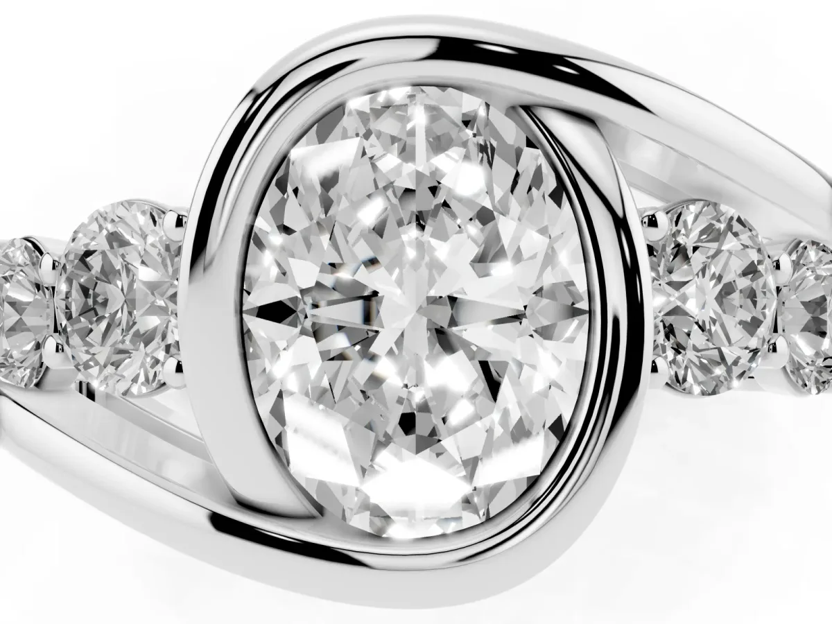 Bezel Set Oval Cut Diamond Bypass Ring with Round Accents Platinum