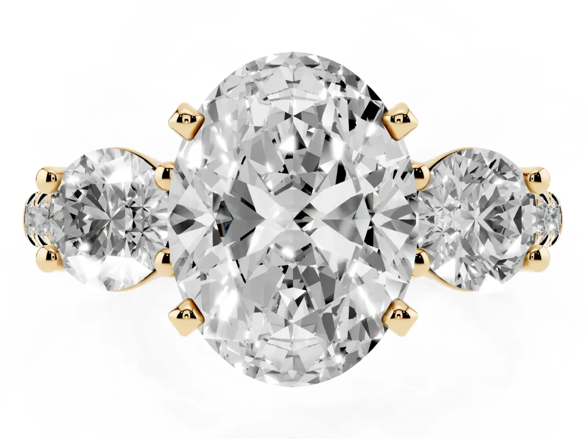 Three-Stone Oval Cut Diamond Pavé Band with Four-Prong Setting Yellow gold