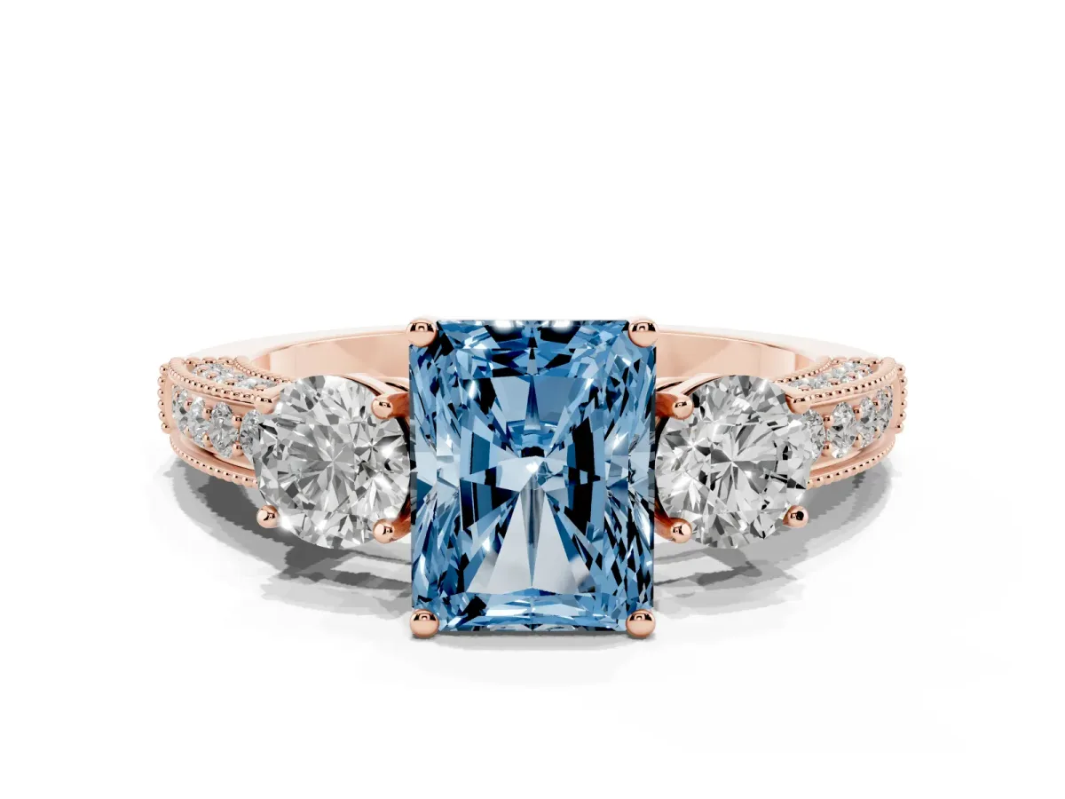 Fancy Blue Radiant Cut Three-Stone Diamond Ring with Pavé Band and Four-Prong Setting Rose gold