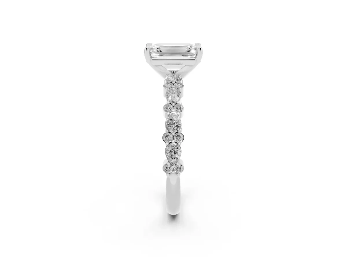 Emerald Cut Diamond Side Stone Solitaire Ring with Round and Four-Prong Setting Silver