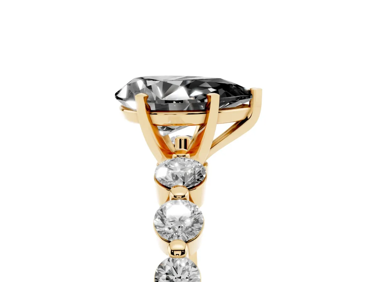 Fancy Black Pear Cut Solitaire Diamond Ring with Pave Band and Four-Prong Setting Yellow gold