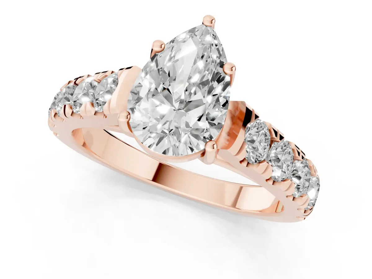 Pear Cut Cut Diamond Solitaire Ring with Micro Pave Band and Prong Setting Rose gold