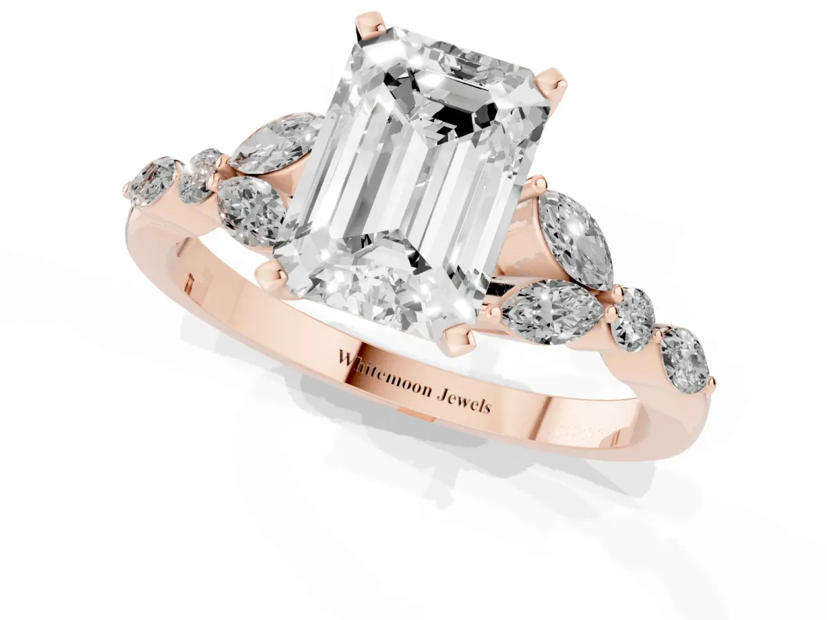 Emerald Cut Diamond Solitaire Ring with Side Stones and Four-Prong Setting Rose gold