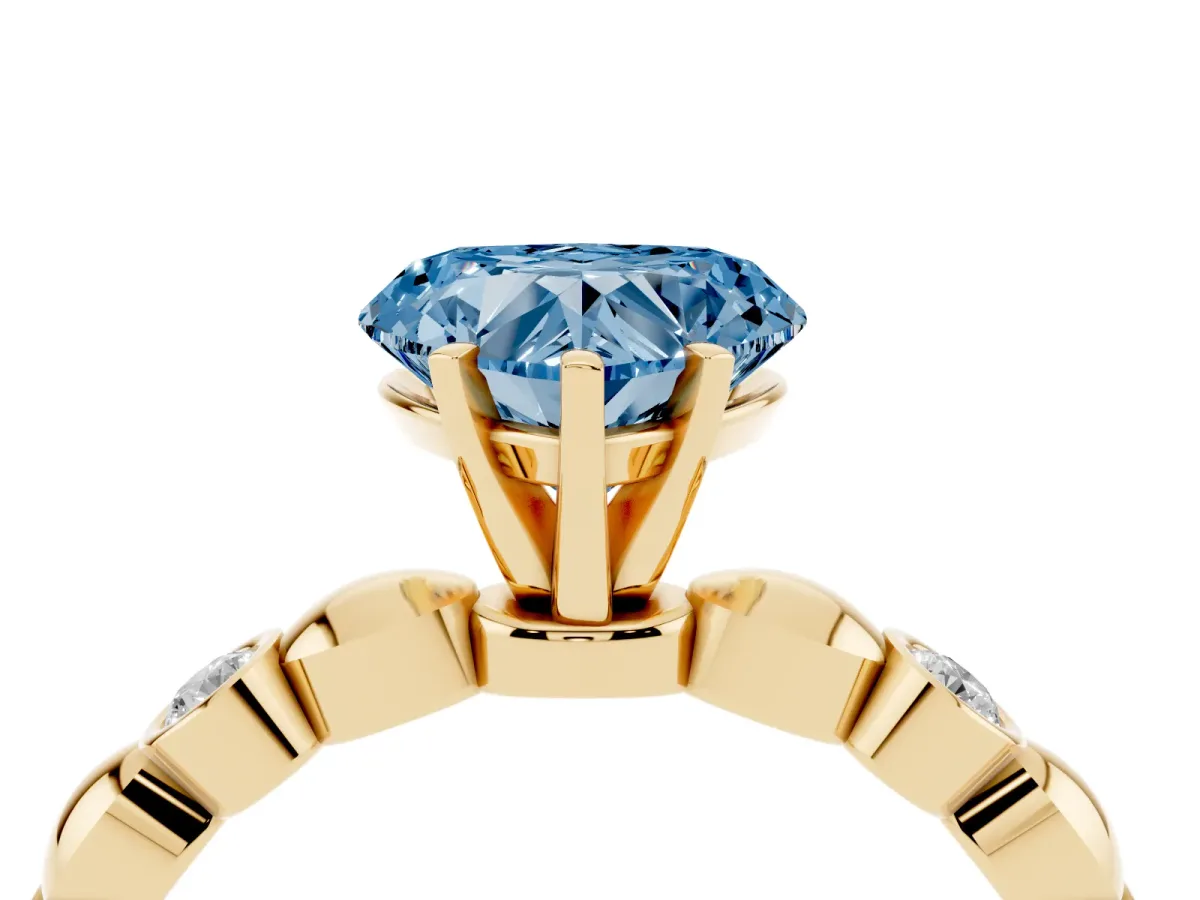Fancy Blue Heart Cut Solitaire Bezel-Set Diamond Ring with Beaded Band and Four-Prong Setting Yellow gold