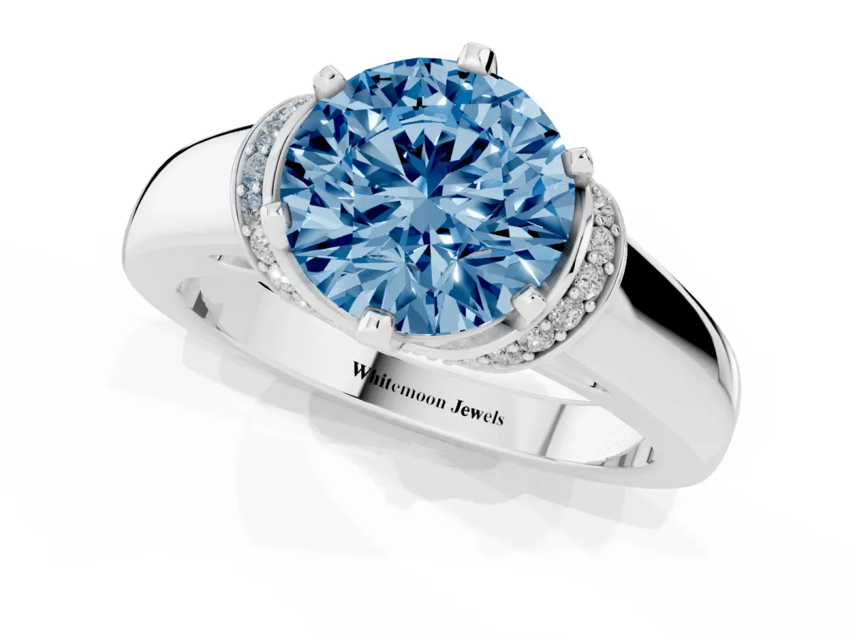 Fancy Blue Round Cut Solitaire Diamond Ring with Pave Band and Six-Prong Setting Silver