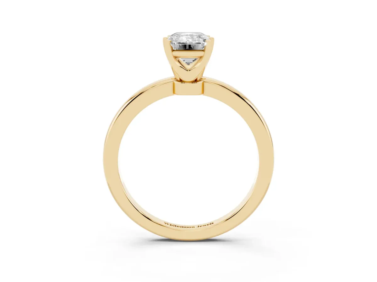 Emerald Cut Solitaire Diamond Ring with Six-Prong Setting on a Classic Band Yellow gold