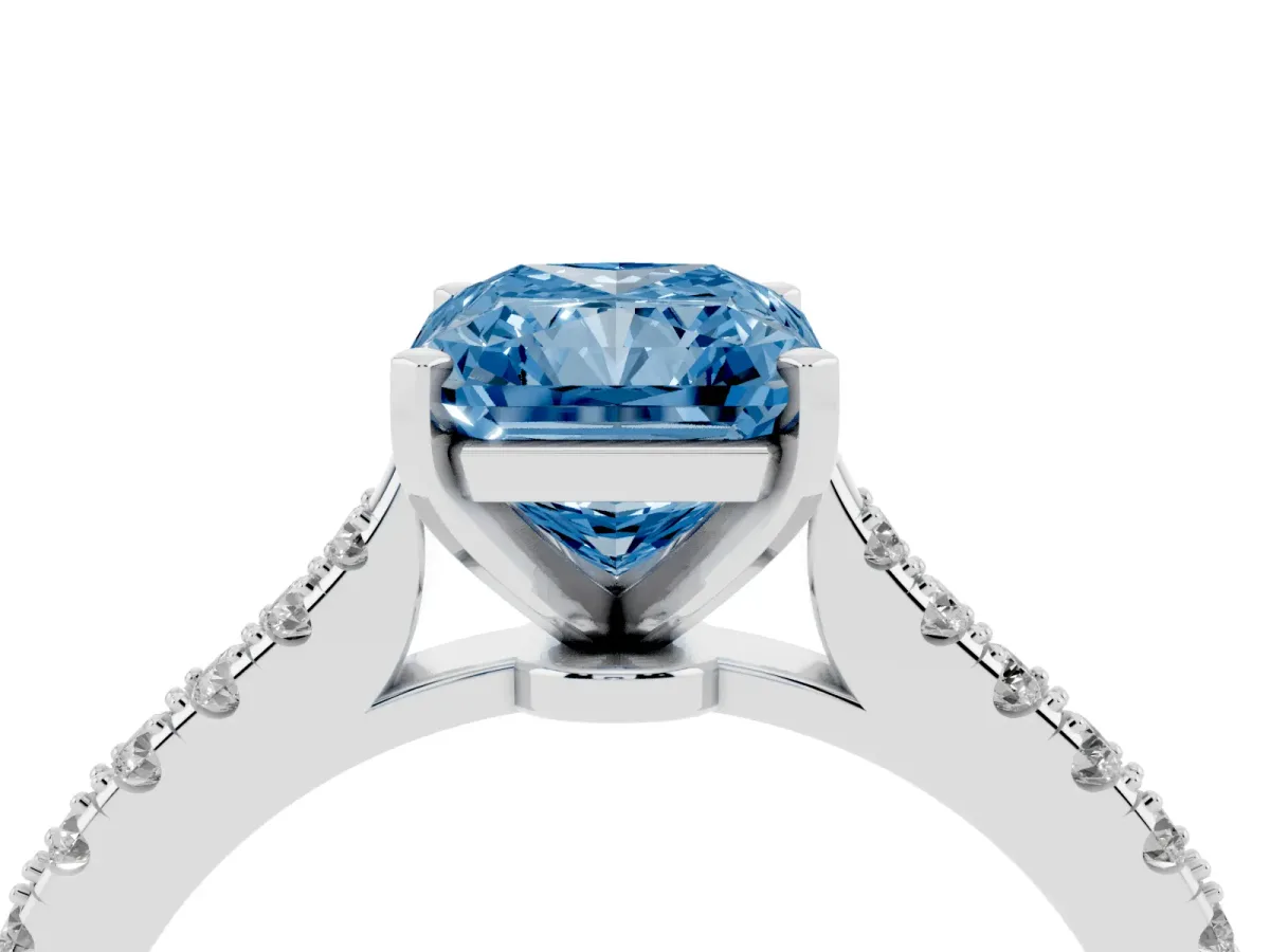 Fancy Blue Radiant Cut Cut Solitaire Diamond Engagement Ring with Pave Band and Four-Prong Setting White gold