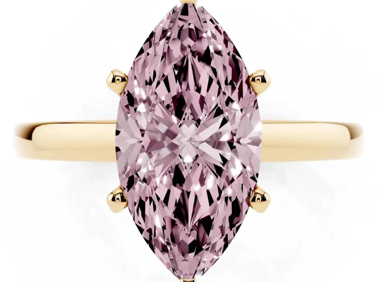 Fancy Pink Marquise Cut Solitaire Diamond Engagement Ring with Four-Prong Setting on a Classic Band Yellow gold