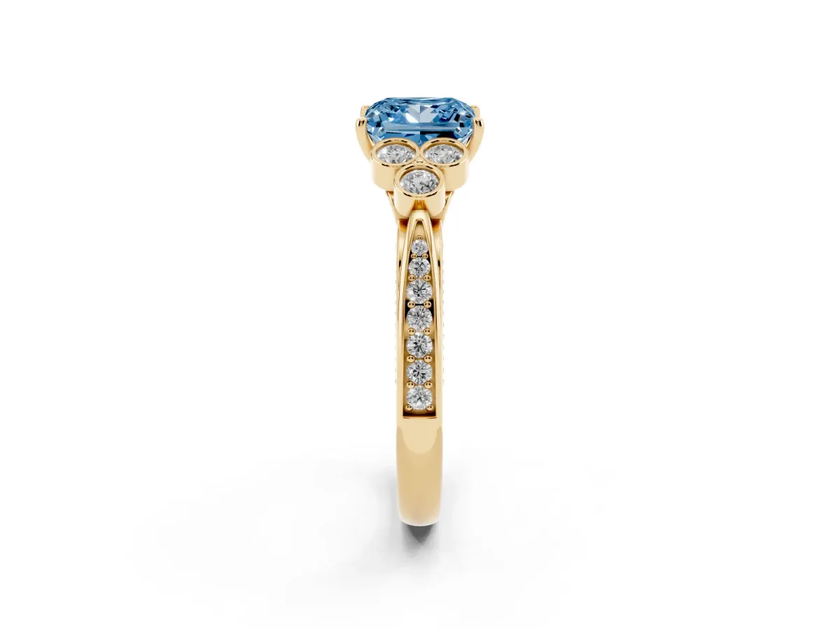 Fancy Blue Princess Cut Cut Diamond Engagement Ring with Bezel Set Round Side Stones and Prong Setting Yellow gold