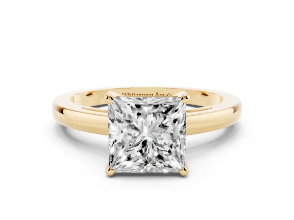 Princess Cut Solitaire Diamond Engagement Ring with Four-Prong Setting on a Classic Band Yellow gold