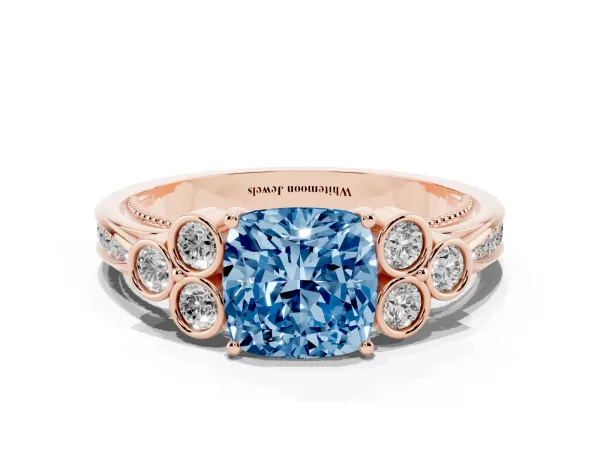 Fancy Blue Cushion Cut Cut Diamond Engagement Ring with Bezel Set Round Side Stones and Prong Setting Rose gold