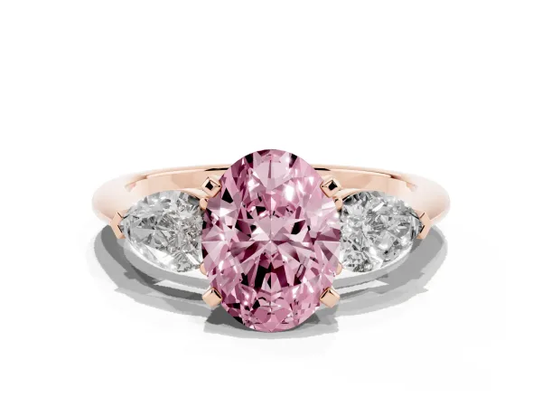 Fancy Pink Three-Stone Oval Cut Diamond Ring with Pear Side Stones and Four-Prong Setting Rose gold