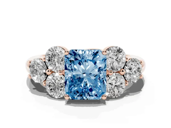 Fancy Blue Radiant Cut Cut Diamond Cluster Ring with Round Accent Stones and Prong Setting on a Classic Band Rose gold