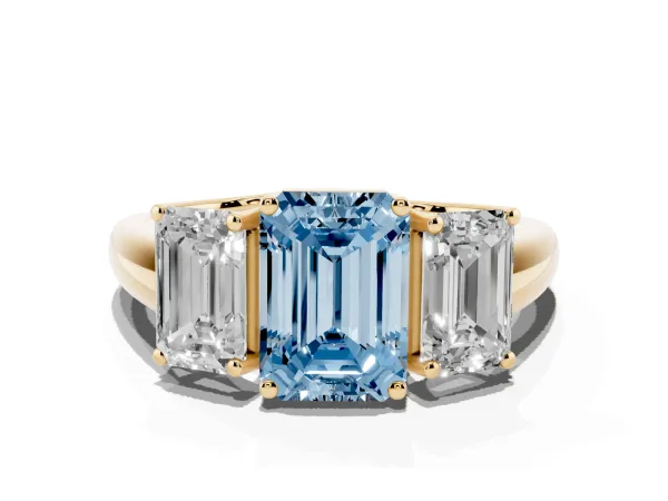 Fancy Blue Three-Stone Emerald Cut Diamond Engagement Ring with Prong Setting Yellow gold