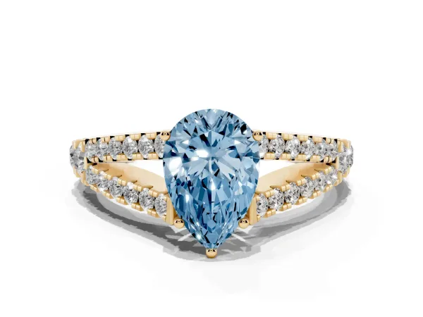 Fancy Blue Pear Cut Diamond Split Shank Pavé Engagement Ring with Four-Prong Setting Yellow gold