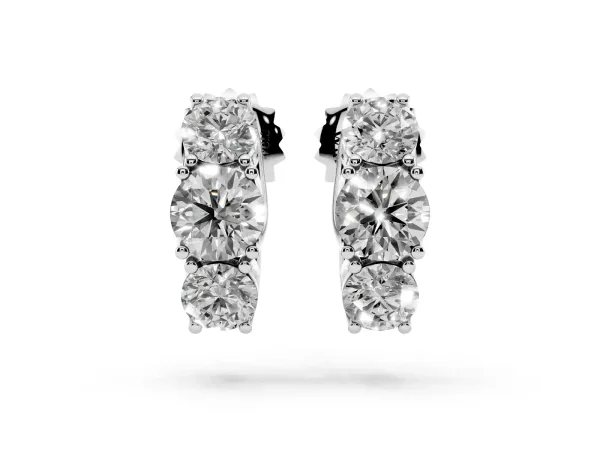 Round Diamond Prong Set Three-Stone White Gold Earrings Silver