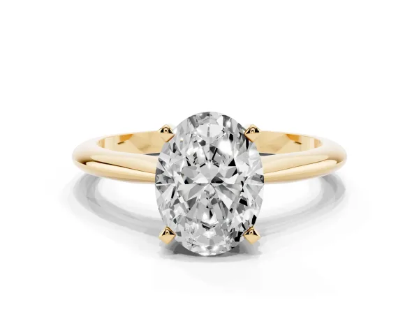 Oval Cut Cut Solitaire Ring with Four-Prong Setting on a Classic Band Yellow gold