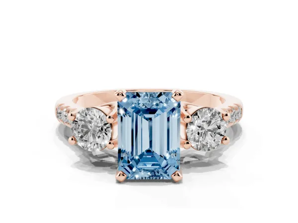 Fancy Blue Three-Stone Emerald Cut Diamond Pavé Band with Four-Prong Setting Rose gold