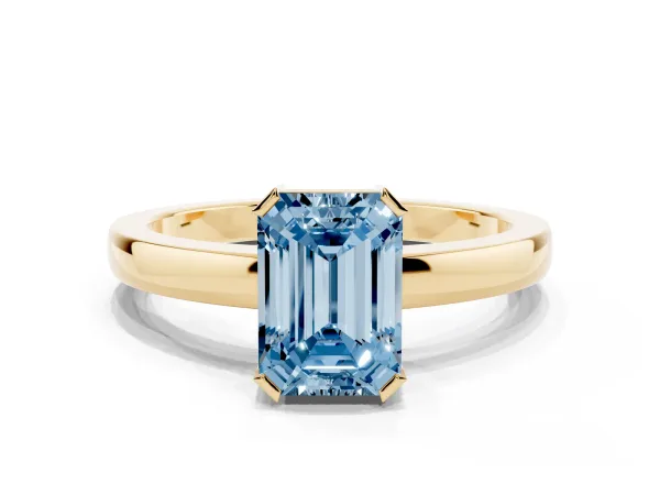 Fancy Blue Emerald Cut Cut Solitaire Ring with Four-Prong Setting and Classic Band Yellow gold