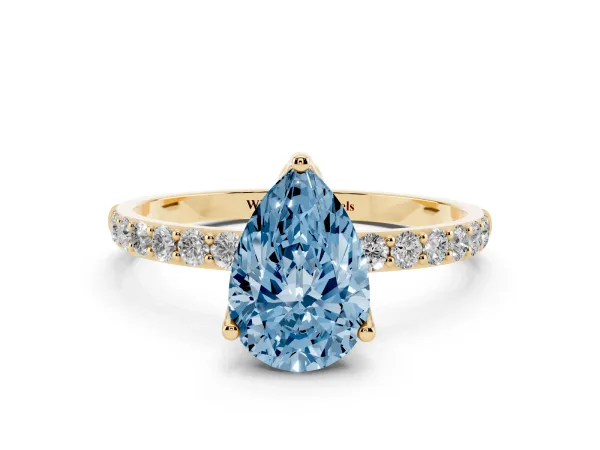 Fancy Blue Pear Cut Diamond Solitaire Engagement Ring with Round Pavé Band and Prong Setting Yellow gold