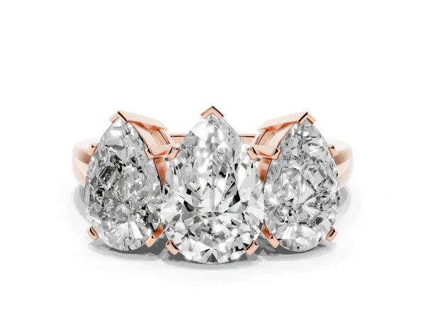 Three-Stone Pear Cut Cut Diamond Ring with Channel Set Band and Four-Prong Setting Rose gold