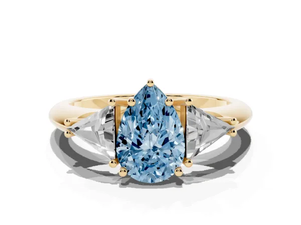 Fancy Blue Three-Stone Pear Cut Diamond Engagement Ring with Trillion Side Stones and Prong Setting Yellow gold