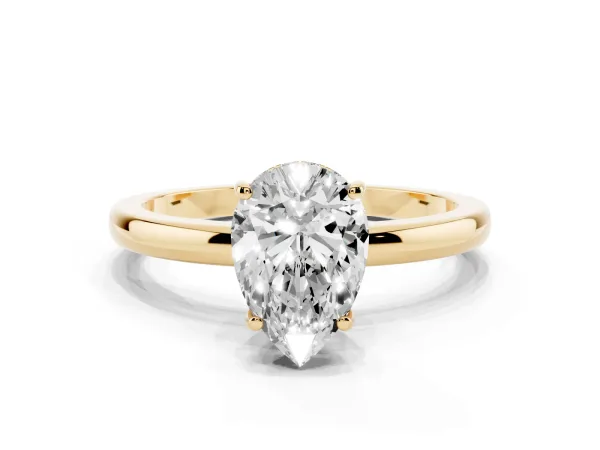 Pear Cut Solitaire Diamond Ring with Prong Setting and Plain Band Yellow gold