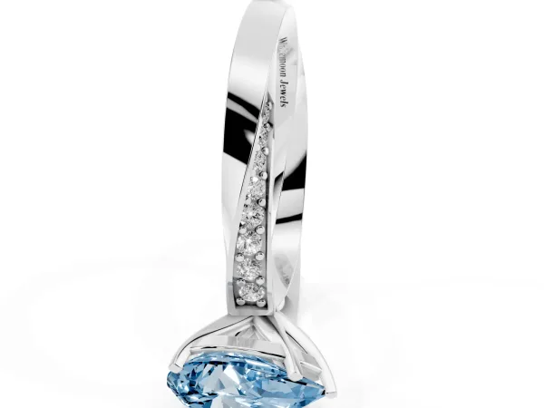 Fancy Blue Pear Cut Diamond Engagement Ring with Side Stone Accents and Four-Prong Setting Platinum