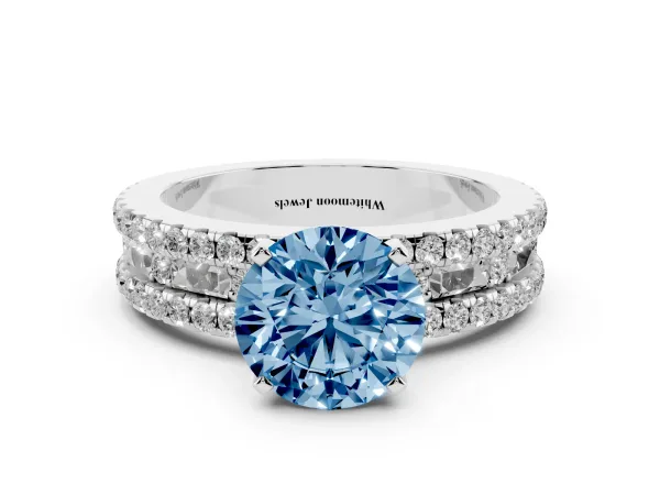 Fancy Blue Round Cut Diamond Solitaire Ring with Pavé and Channel Set Band White gold