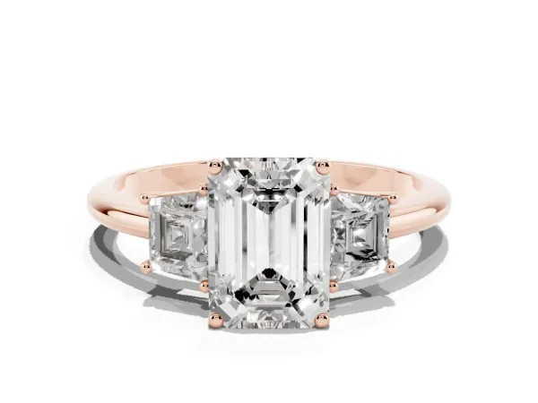 Emerald Cut Diamond Three-Stone Ring with Trapezoid Side Stones and Prong Setting Rose gold