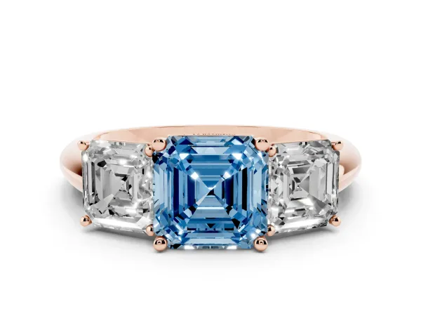 Fancy Blue Three-Stone Asscher Cut Cut Diamond Engagement Ring with Prong Setting on a White Gold Band Rose gold