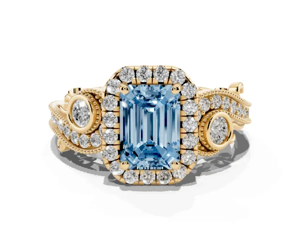 Fancy Blue Emerald Cut Halo Diamond Ring with Milgrain and Bezel Accents on a Split Shank Band Yellow gold
