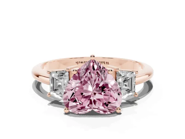 Fancy Pink Heart Cut Diamond Three-Stone Ring with Trapezoid Side Stones and Prong Setting Rose gold