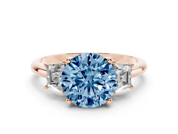 Fancy Blue Round Cut Diamond Three-Stone Ring with Trapezoid Side Stones and Prong Setting Rose gold