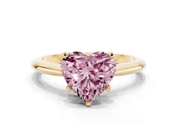 Fancy Pink Heart Cut Cut Solitaire Ring with Four-Prong Setting on a Classic Band Yellow gold