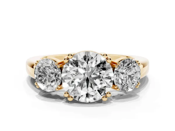 Three-Stone Round Cut Cut Diamond Ring with Channel Set Band and Four-Prong Setting Yellow gold