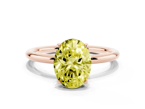 Fancy Yellow Oval Cut Solitaire Diamond Ring with a Classic Band and Four-Prong Setting Rose gold