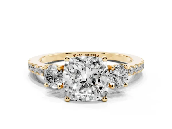 Three-Stone Cushion Cut Cut Diamond Pavé Band with Prong Setting Yellow gold