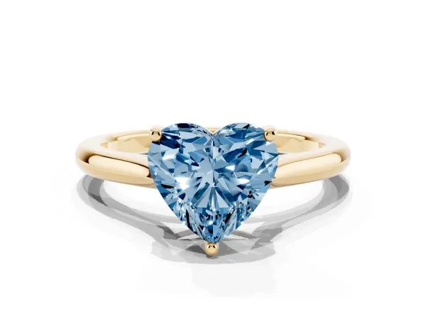 Fancy Blue Heart Cut Cut Solitaire Ring with Cathedral Band and Four-Prong Setting Yellow gold