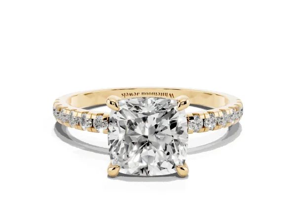 Cushion Cut Diamond Brilliant Solitaire Ring with Pavé Band and Four-Prong Setting Yellow gold