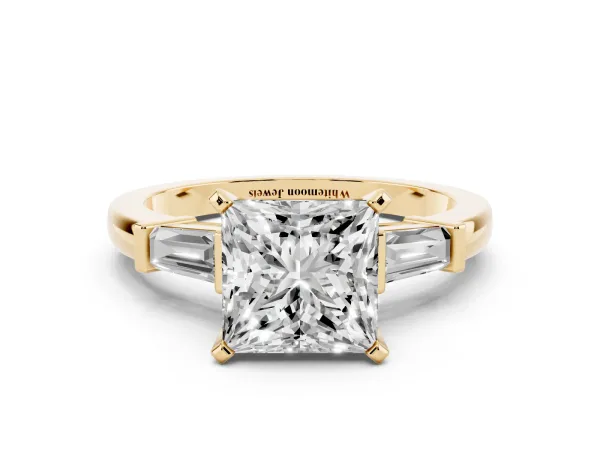 Princess Cut Cut Diamond Solitaire Ring with Tapered Baguette Accents and Four-Prong Setting Yellow gold