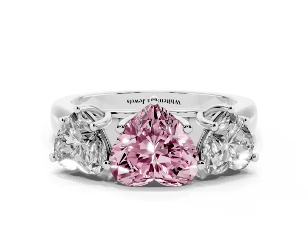 Fancy Pink Heart Cut Three-Stone Diamond Ring with Prong Setting on a Classic Band Platinum