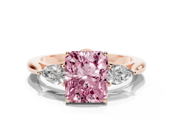 Fancy Pink Three-Stone Radiant Cut Diamond Ring with Pear Side Stones in Four-Prong Setting Rose gold