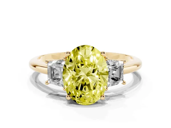 Fancy Yellow Oval Cut Diamond Three-Stone Ring with Trapezoid Side Stones and Prong Setting Yellow gold