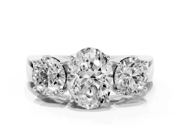 Three-Stone Oval Cut Diamond Ring with Round Side Stones, Classic Band, and Four-Prong Setting Platinum