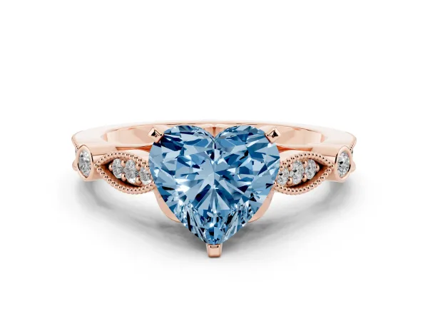 Fancy Blue Heart Cut Cut Diamond with Milgrain Marquise and Bezel Accents on a Solitaire Band with Prong Setting Rose gold